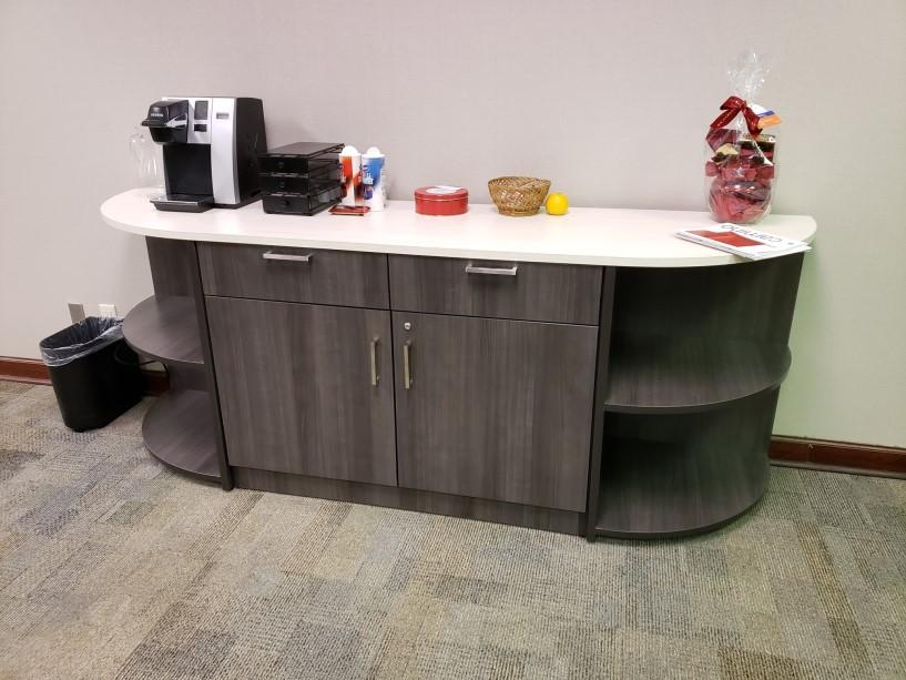 A counter top with a large assortment of items on it