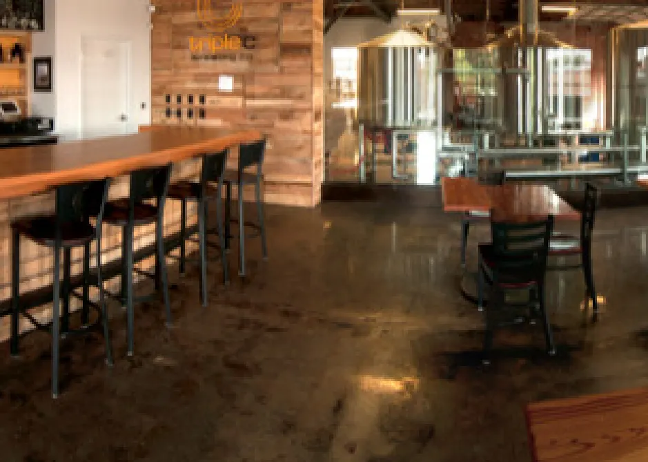 A large wooden table in a large room