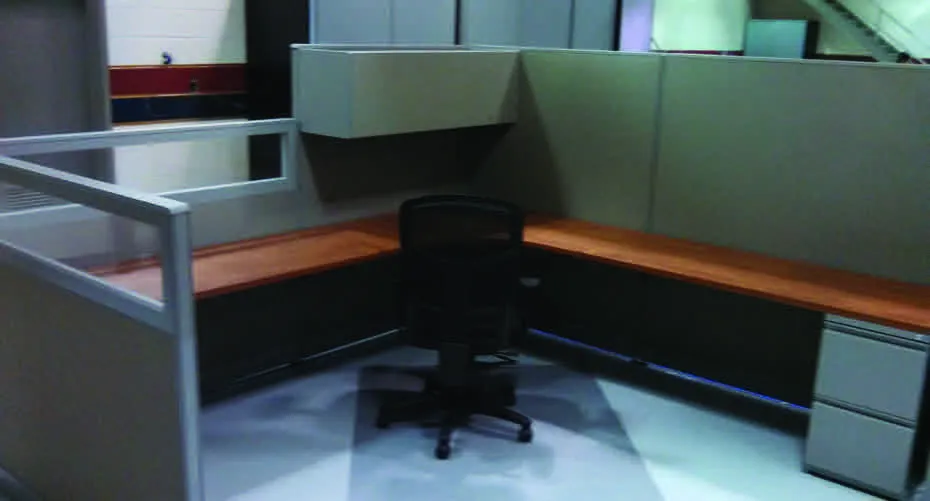 A room with a chair and a desk