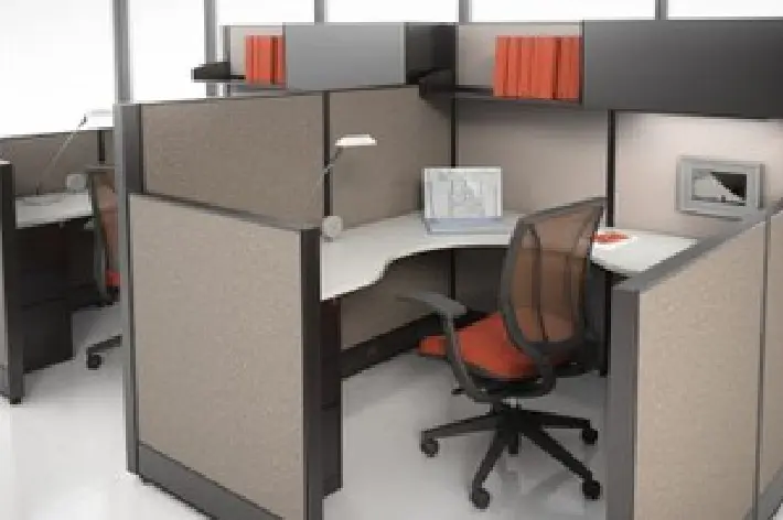 A small office with a large wooden desk