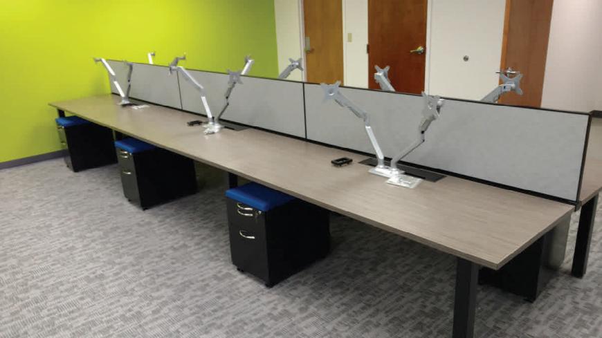 A table with two laptop computers on it
