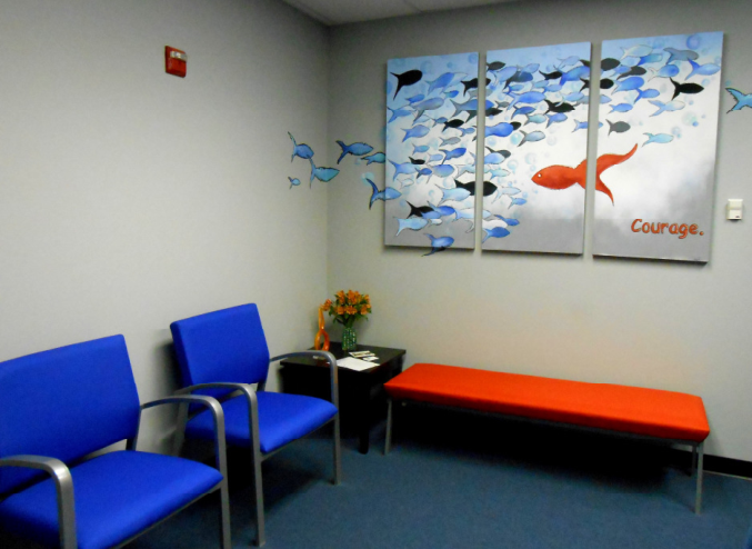 A blue and white striped wall with a blue wall and a blue wa